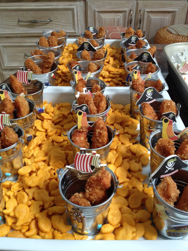 Pirate Party Finger Food Ideas
 Pirate party food… Chicken finger pails on a sea of