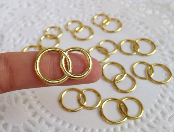 Plastic Wedding Rings
 48 Plastic Joined Gold tone Wedding Rings for Cupcake Toppers