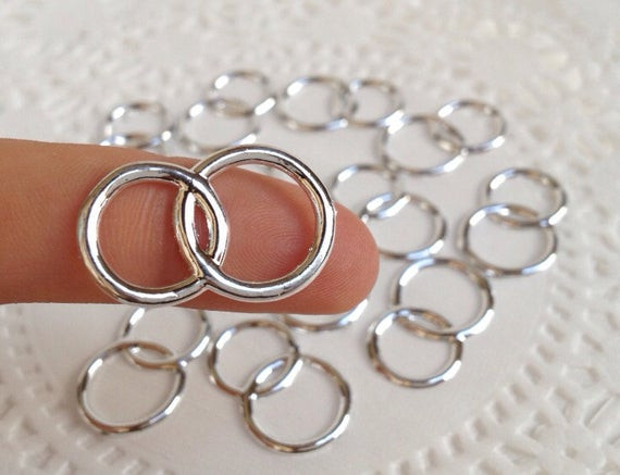 Plastic Wedding Rings
 48 Plastic Joined Silver tone Wedding Rings for Cupcake