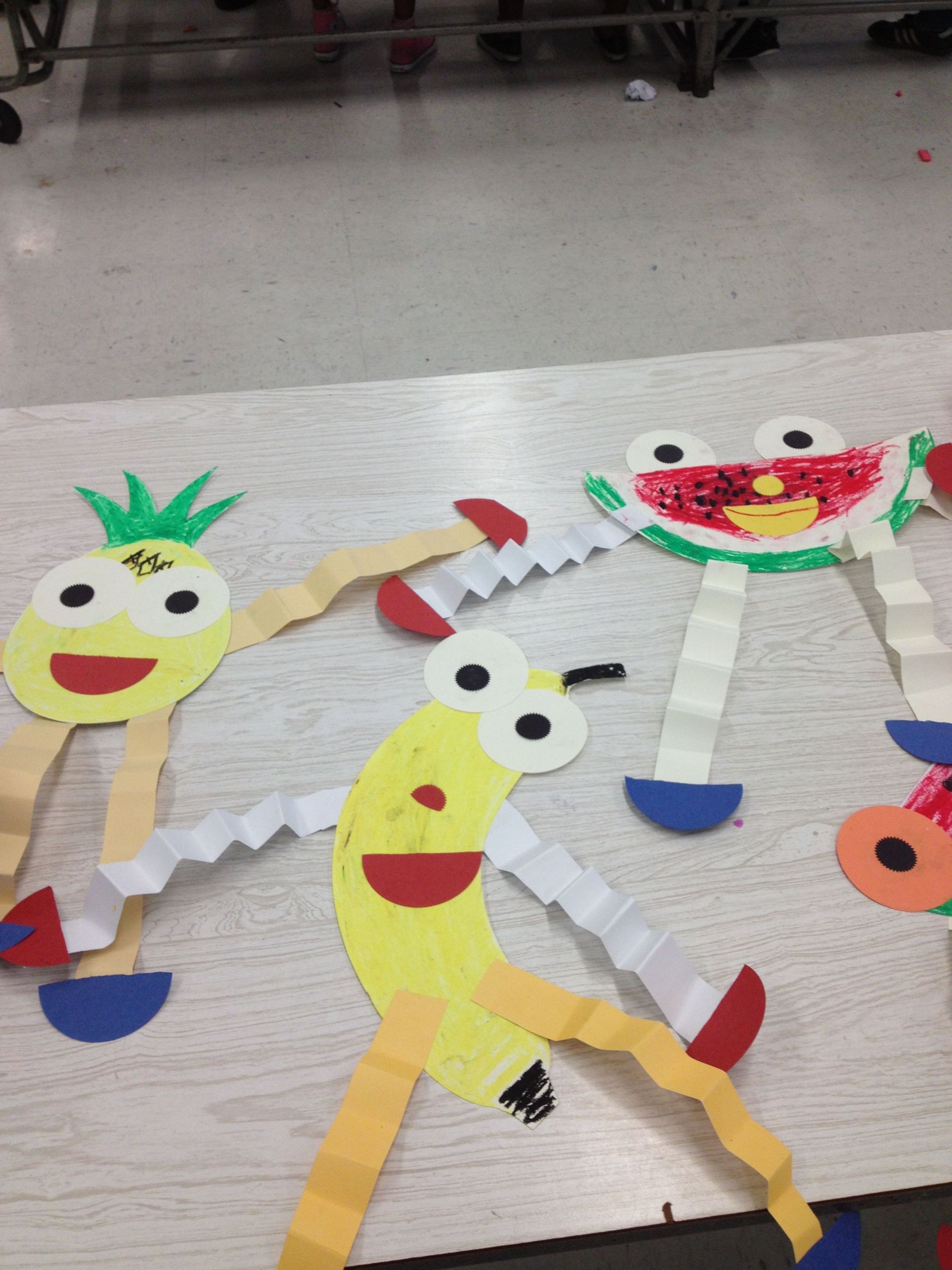 Preschool Crafts Activities
 Making paper Fruit puppets teaching preschoolers the