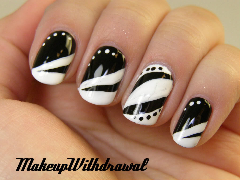 Pretty Black Nails
 50 Most Beautiful Black And White Nail Art Designs