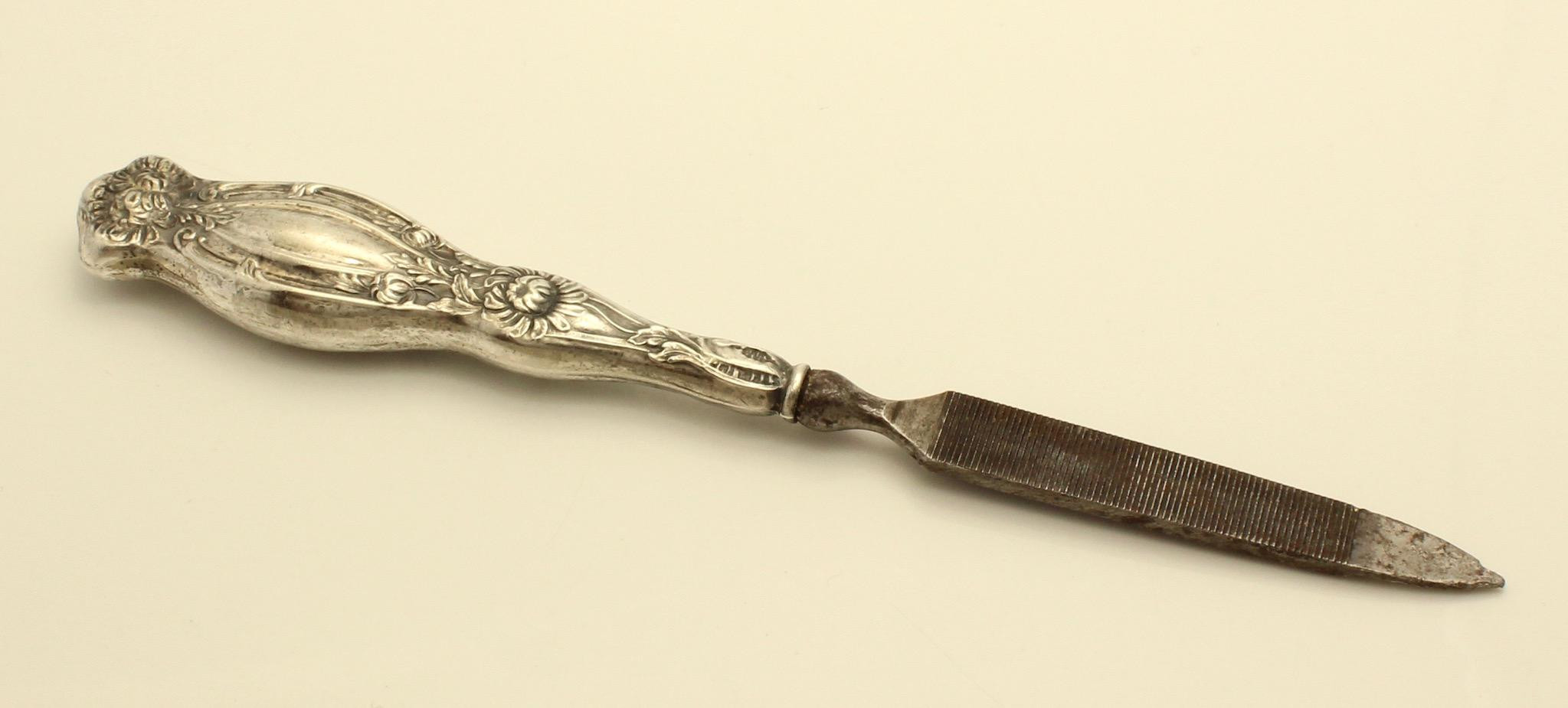 Pretty Nails Oswego Ny
 Antique Art Nouveau Sterling Floral Nail File by Webster