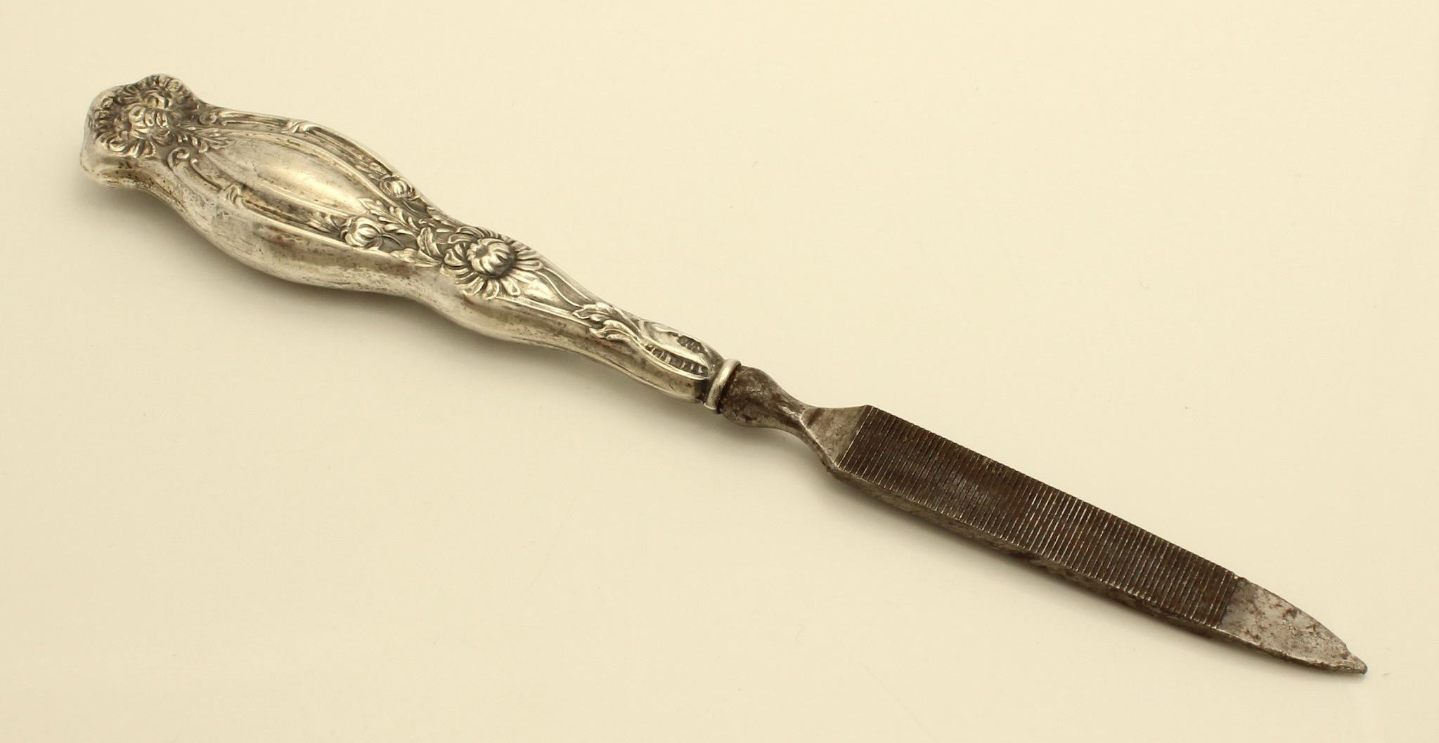 Pretty Nails Oswego Ny
 Antique Art Nouveau Sterling Floral Nail File by Webster