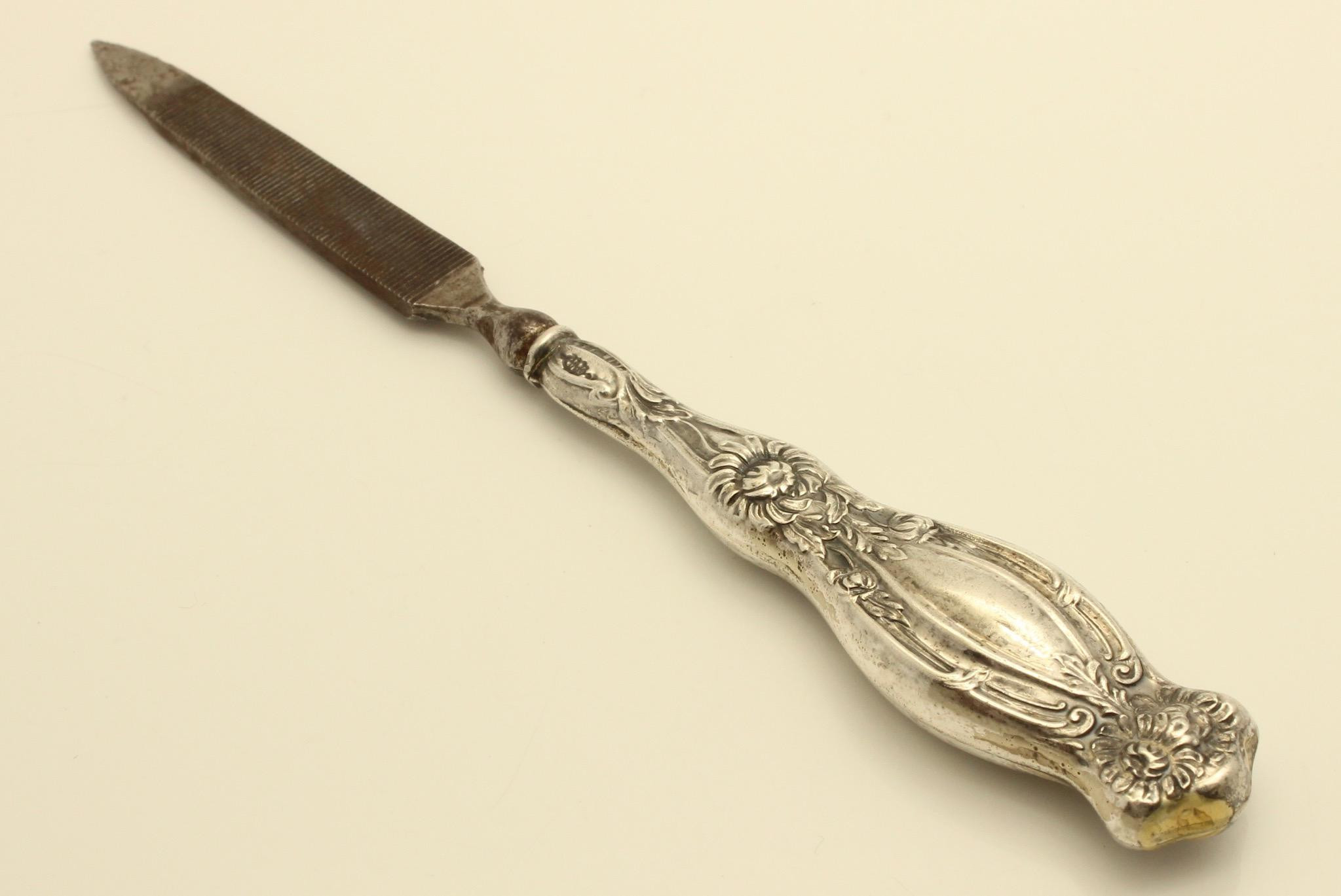 Pretty Nails Oswego
 Antique Art Nouveau Sterling Floral Nail File by Webster