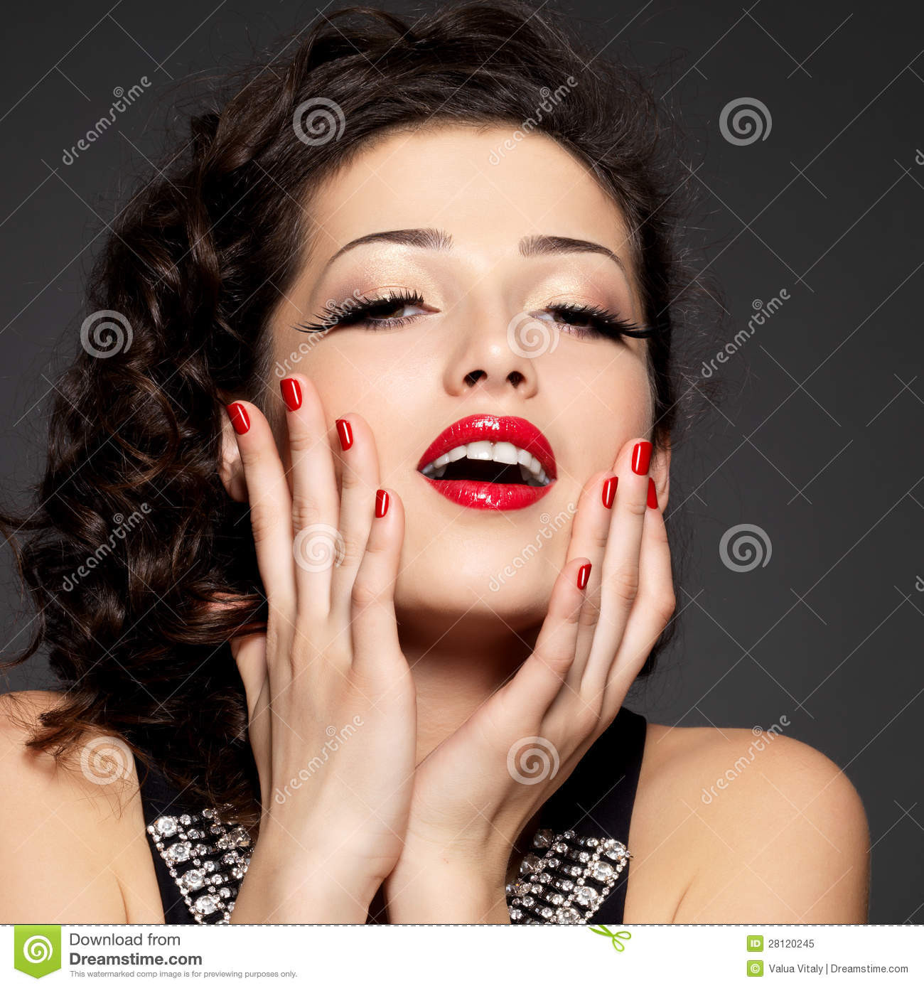 Pretty Woman Nails
 Young Pretty Woman With Red Nails And Lips Stock Image