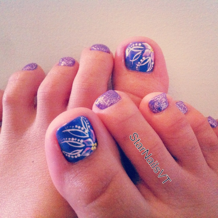 Purple Toe Nail Designs
 Sparkly purple toe nails and pretty flowers