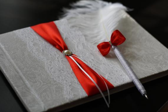 Red And White Wedding Guest Book
 Wedding Guest Book with red ribbon and white lace by