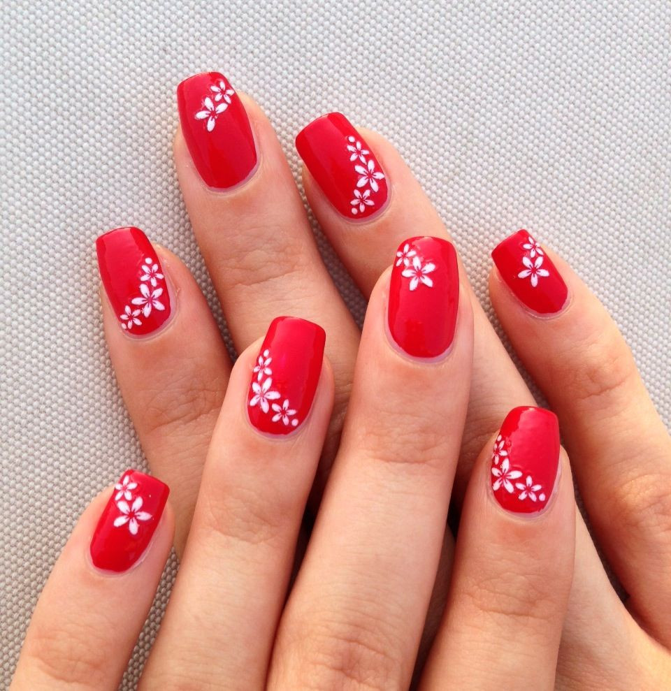 Red Gel Nail Designs
 red nails with white flowers simple nail art