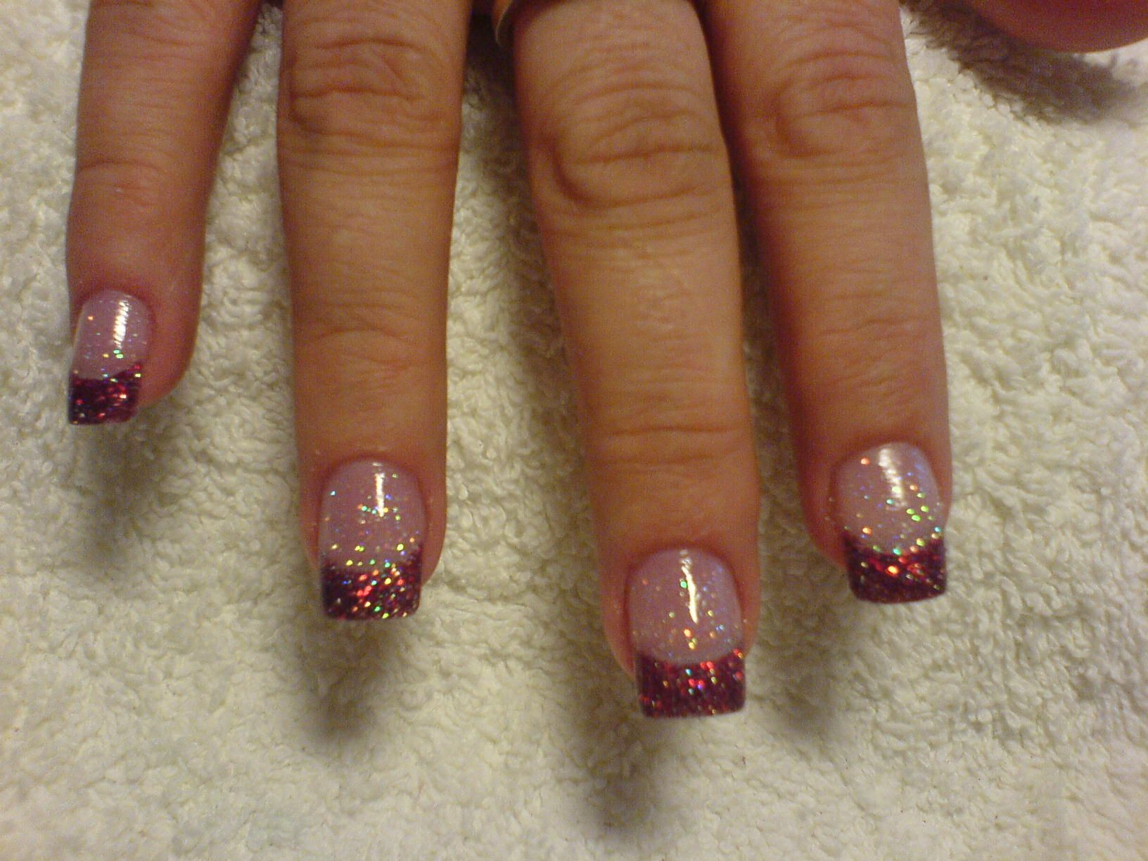 Red Glitter Tip Nails
 Red glitter Christmas nails possibly