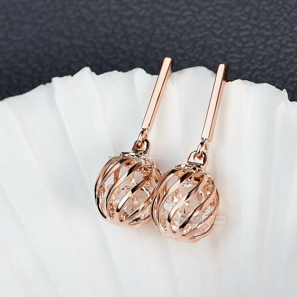 Rose Gold Drop Earrings
 18k rose gold gf made with SWAROVSKI crystal ball filigree