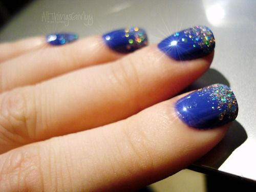 Royal Blue Glitter Nails
 royal blue nail polish with silver glitter tips