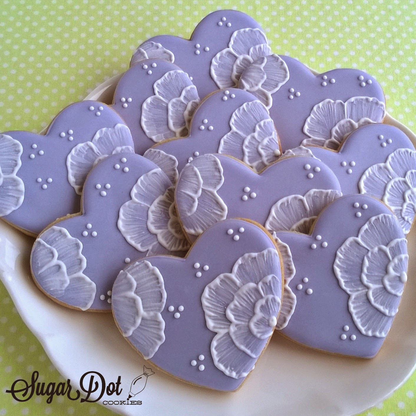 Royal Icing Sugar Cookies
 The flowers on these hearts were painted on with royal