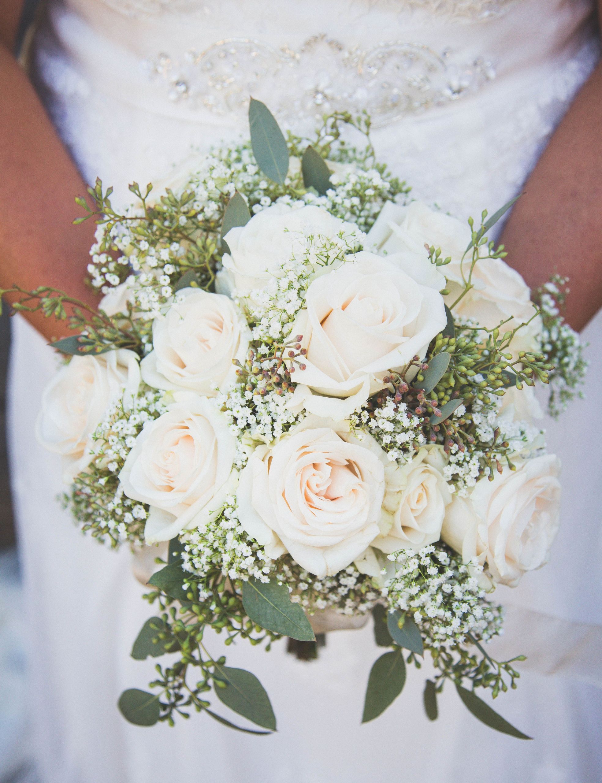 Sams Wedding Flowers
 White roses and assorted greenery from Sam s Club
