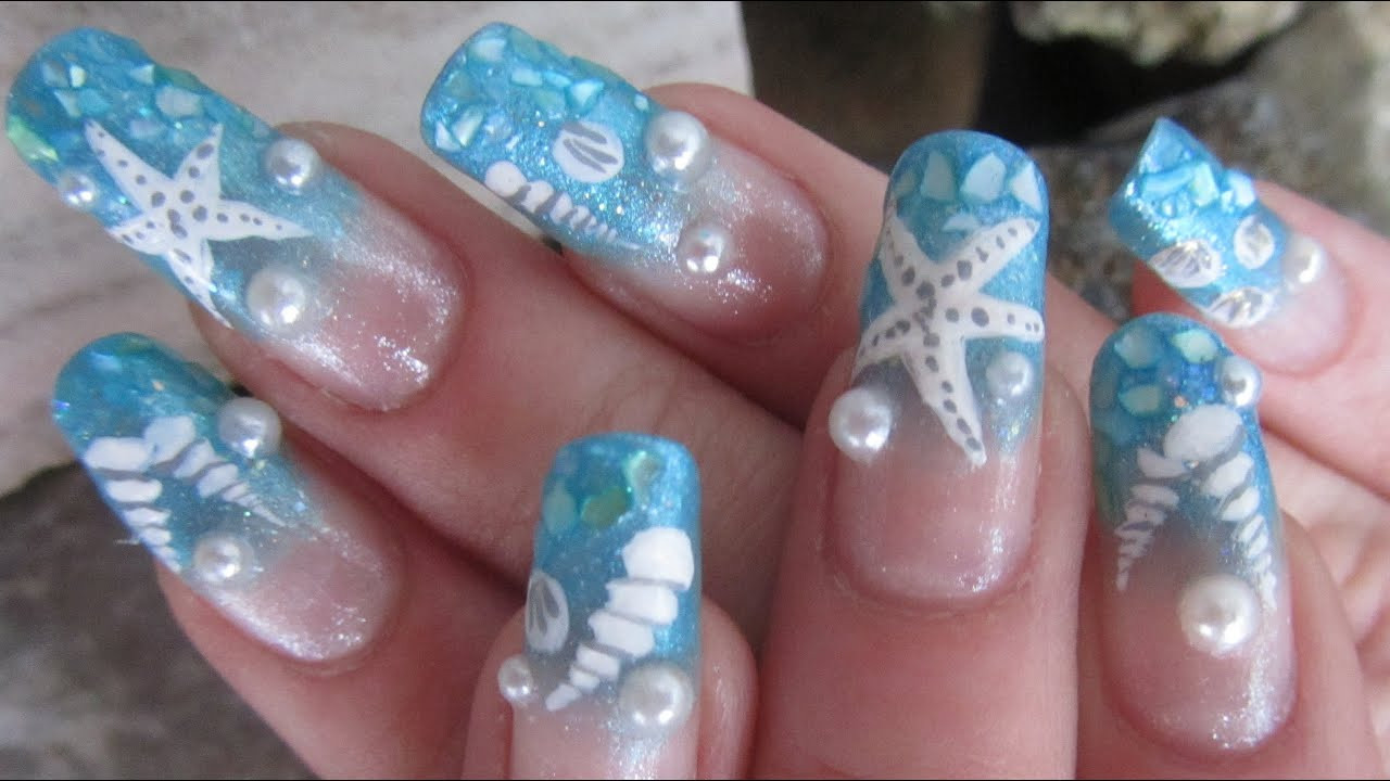Seashell Nail Art
 Ocean Sea Shell Design in Light Blue with Glitter and Half