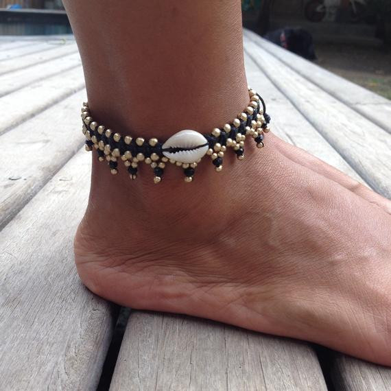 Shell Anklet
 Gold bead and cowrie shell anklet