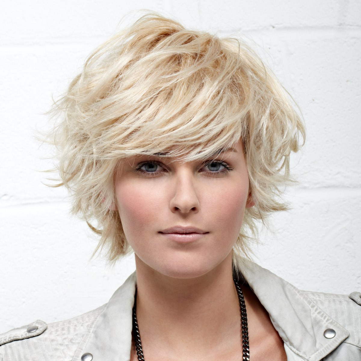 Short Flipped Hairstyle
 Feathery short haircut with the ends flipped up and out