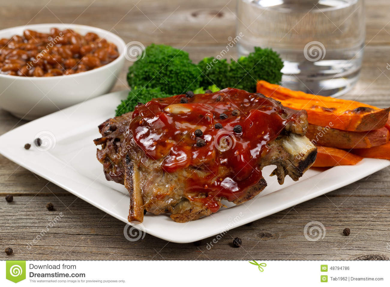 Side Dishes For Bbq Ribs
 Juicy BBQ Ribs And Side Dishes With Water Stock