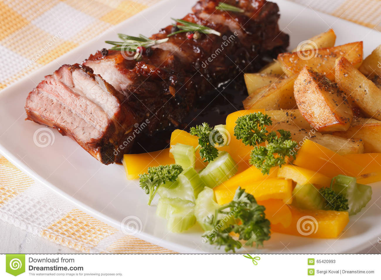 Side Dishes For Bbq Ribs
 BBQ Pork Ribs With A Side Dish Ve ables Close up