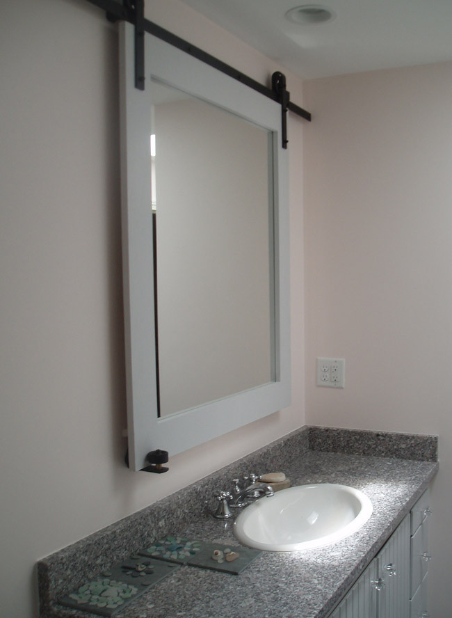 Sliding Bathroom Mirror
 Small Bathroom Design Idea