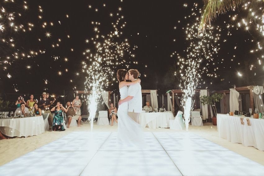 Sparklers For Wedding Reception
 Outdoor dance floor on the beach with Sparklers
