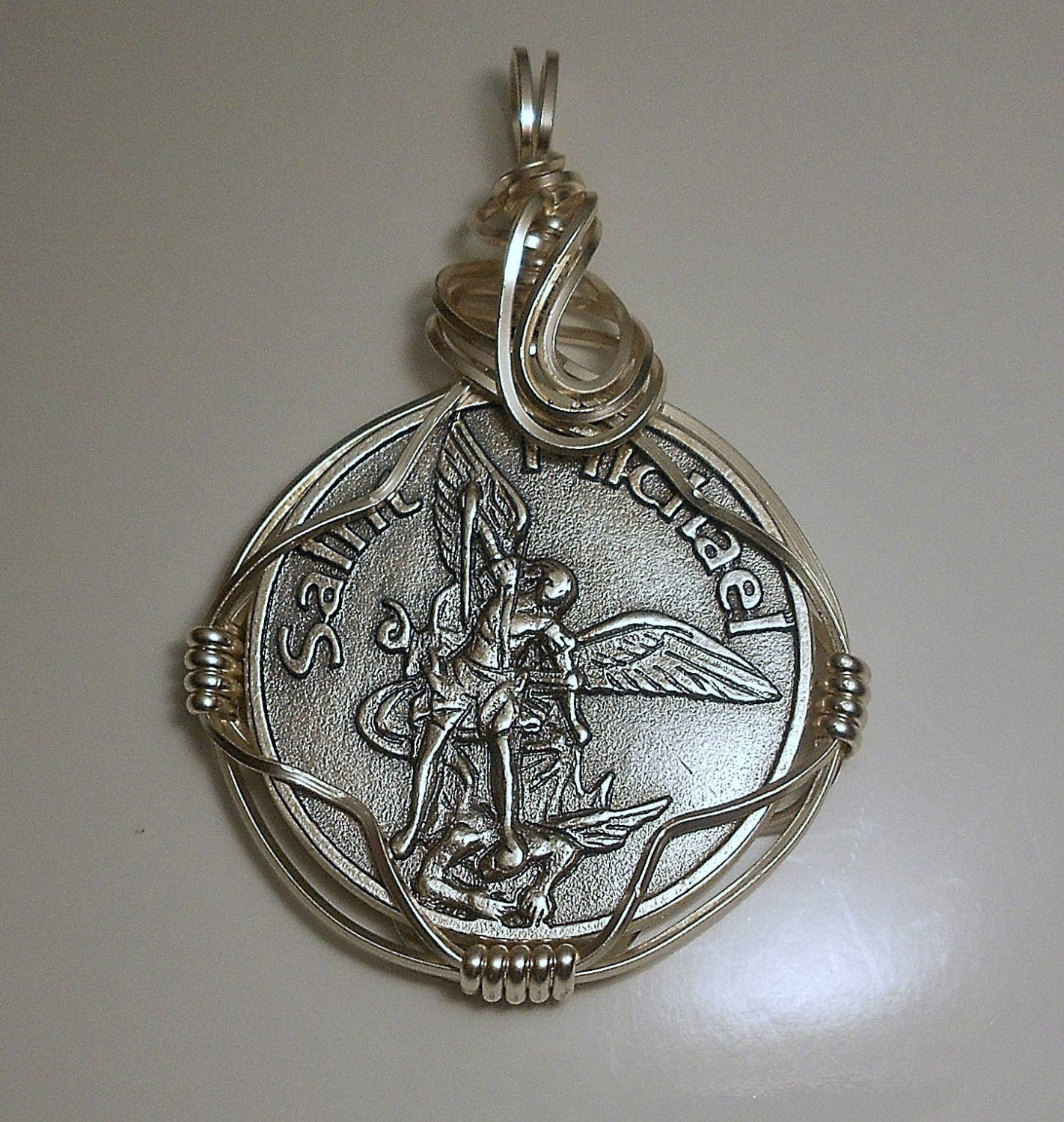 St Michael Necklace
 Archangel Saint Michael Medal Pendant by maddyq on Etsy