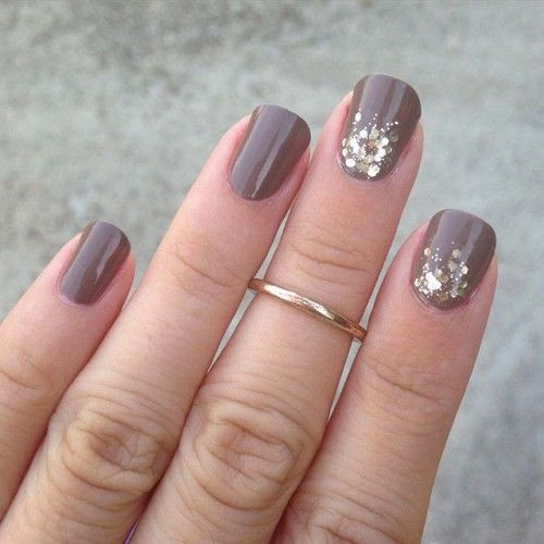 Taupe Nail Designs
 Picture rounded taupe nails with gold glitter touches