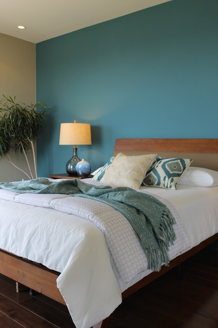 Teal Accent Wall Bedroom
 Teal Blue Wall Ikat Pillows Seeded Glass Lamps Modern
