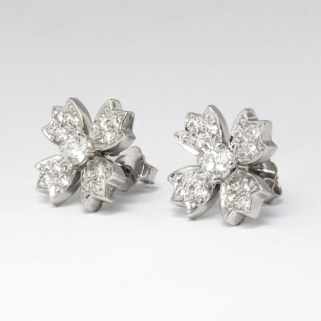 Tiffany Diamond Earrings
 Estate Tiffany & Co 70ct t w Diamond Floret Snowflake