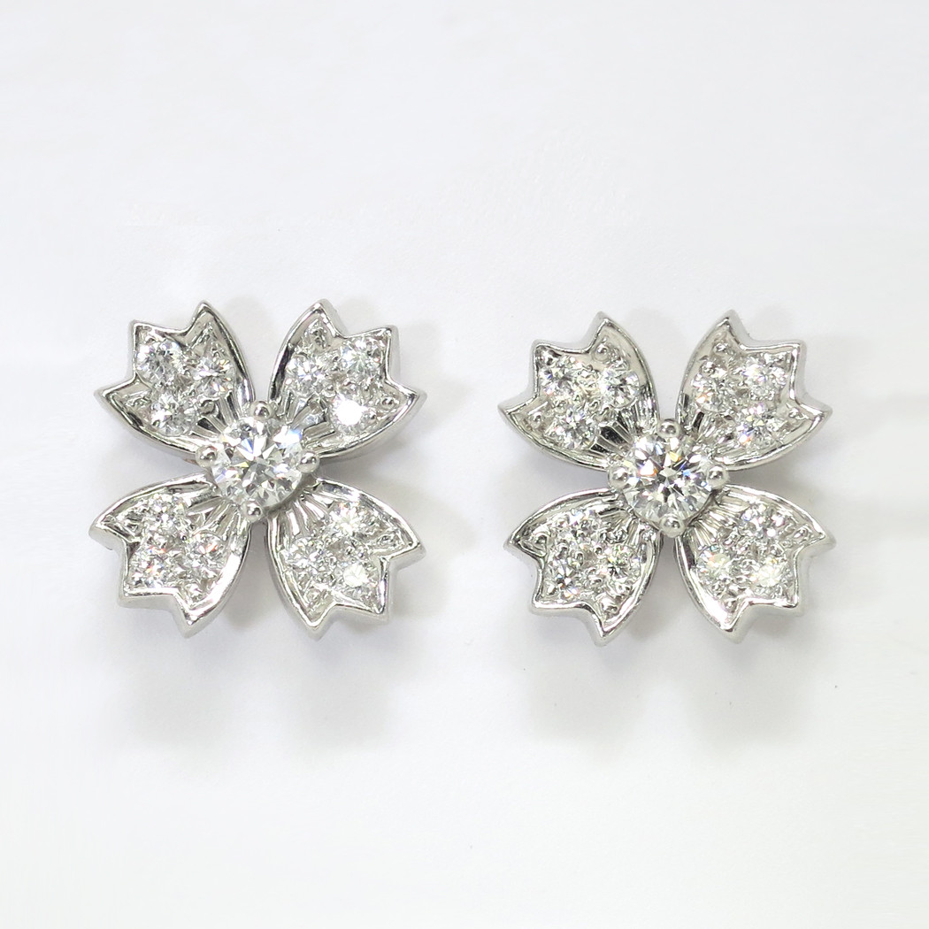 Tiffany Diamond Earrings
 Estate Tiffany & Co 70ct t w Diamond Floret Snowflake