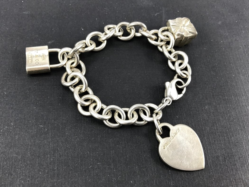 Tiffany Sterling Silver Bracelet
 Tiffany & Co Sterling Silver Heart Tag Bracelet with Lock