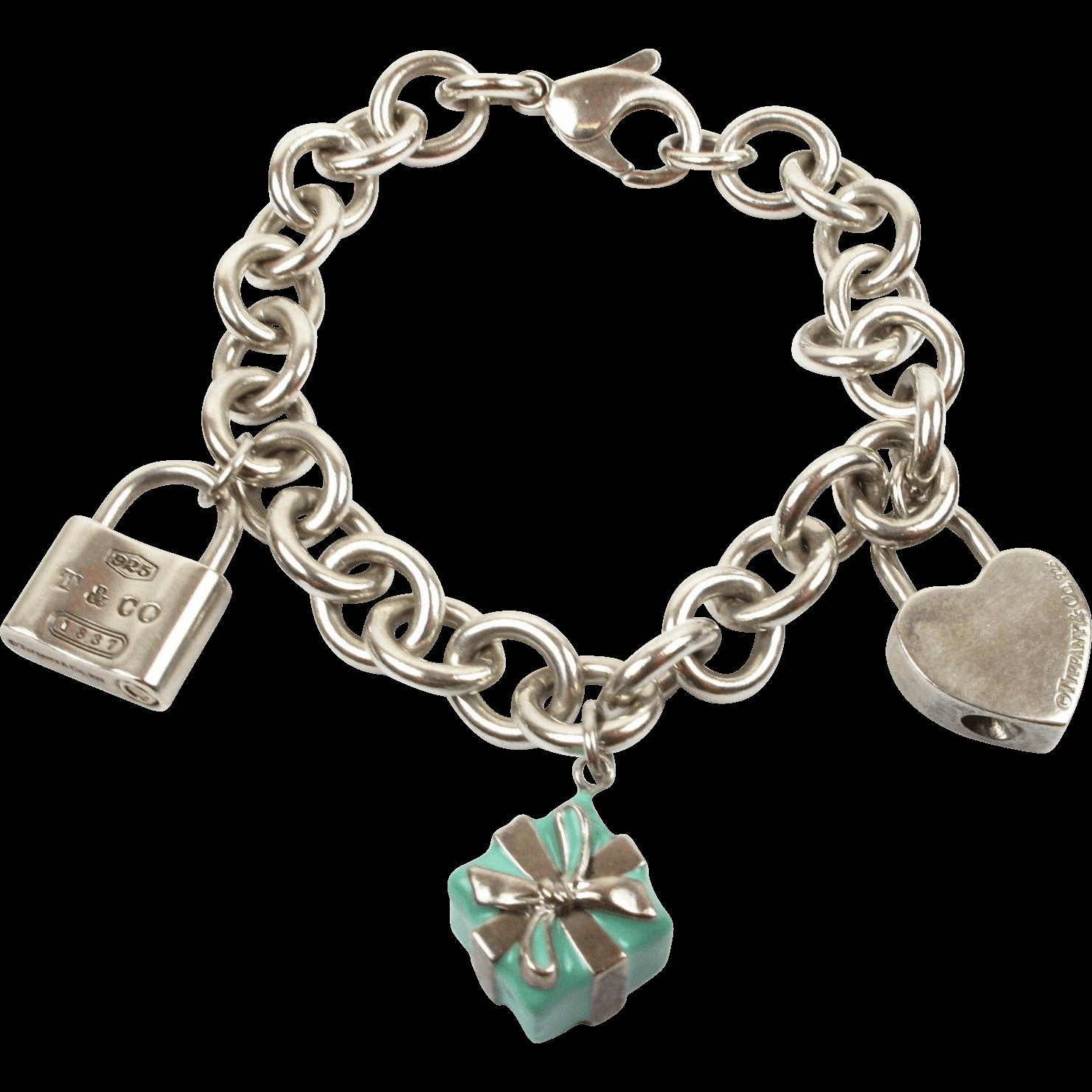 Tiffany Sterling Silver Bracelet
 Authentic Tiffany & Co Sterling Silver Charm Bracelet with