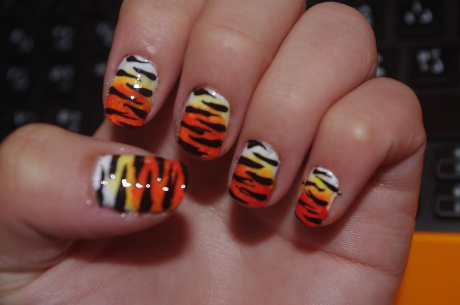 Tiger Nail Art
 tiger nails 2 by solidadino on DeviantArt