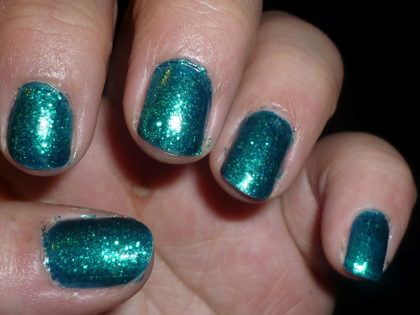 Turquoise Glitter Nails
 The Beauty Fiend