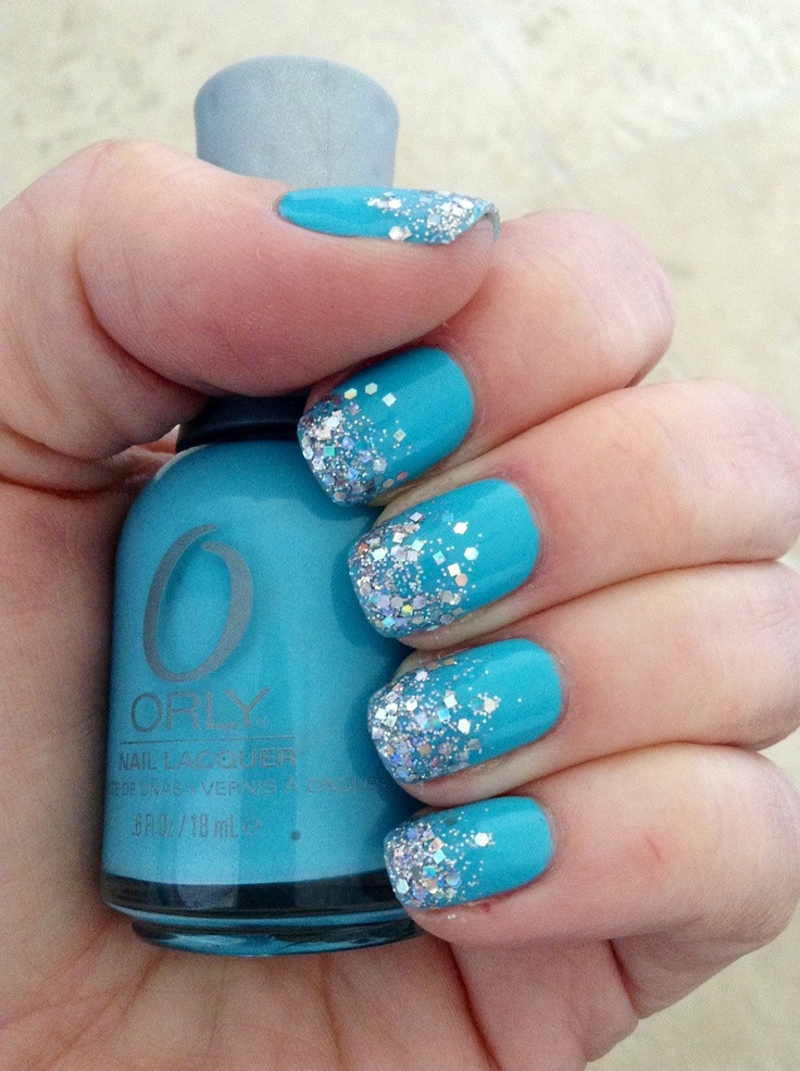Turquoise Glitter Nails
 Nails • Turquoise with irridescent silver glitter tips