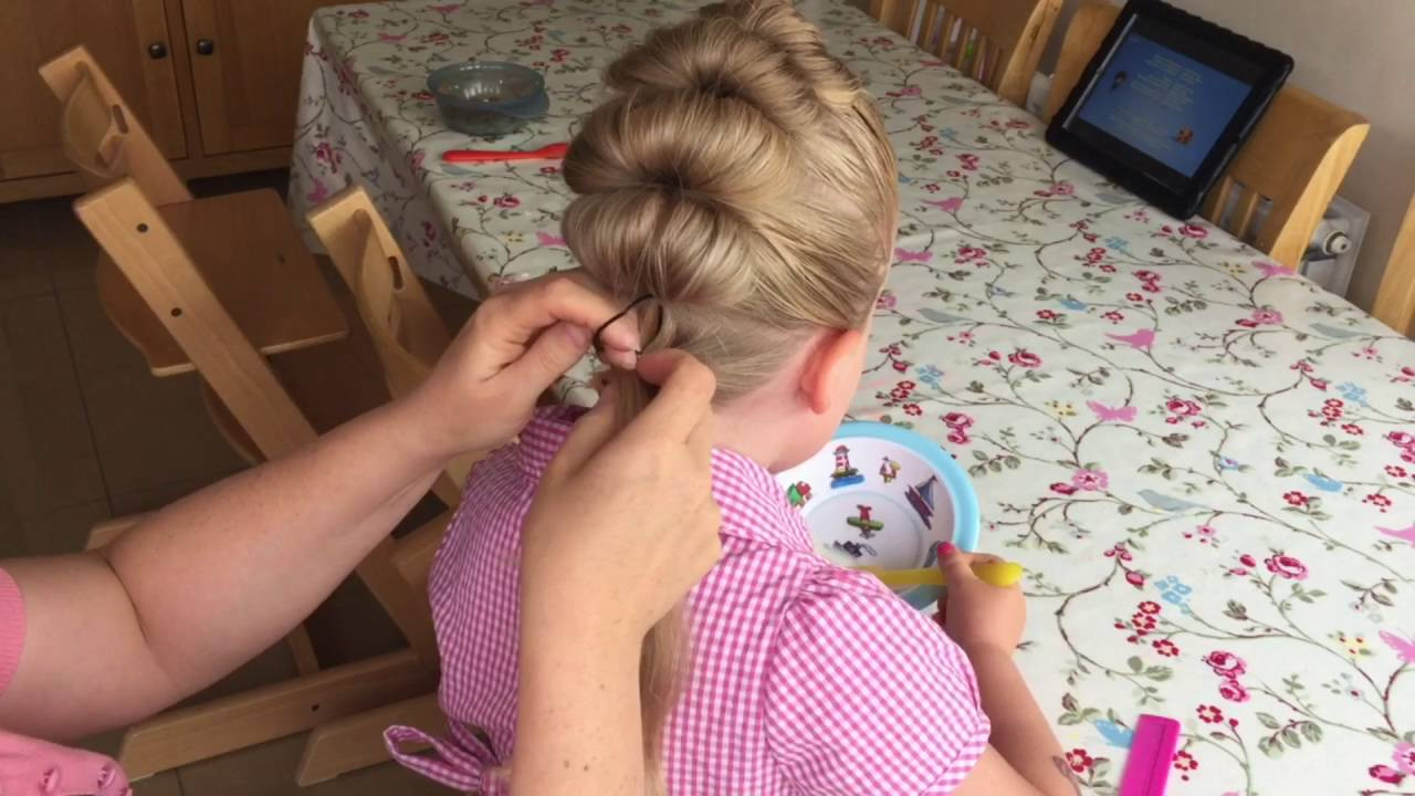 Two Little Girls Hairstyles
 Topsie Tail Faux Hawk tutorial by Two Little Girls