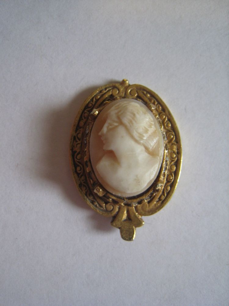 Victorian Brooches
 Antique Victorian Gold Tone Pin Brooch With Hand Carved