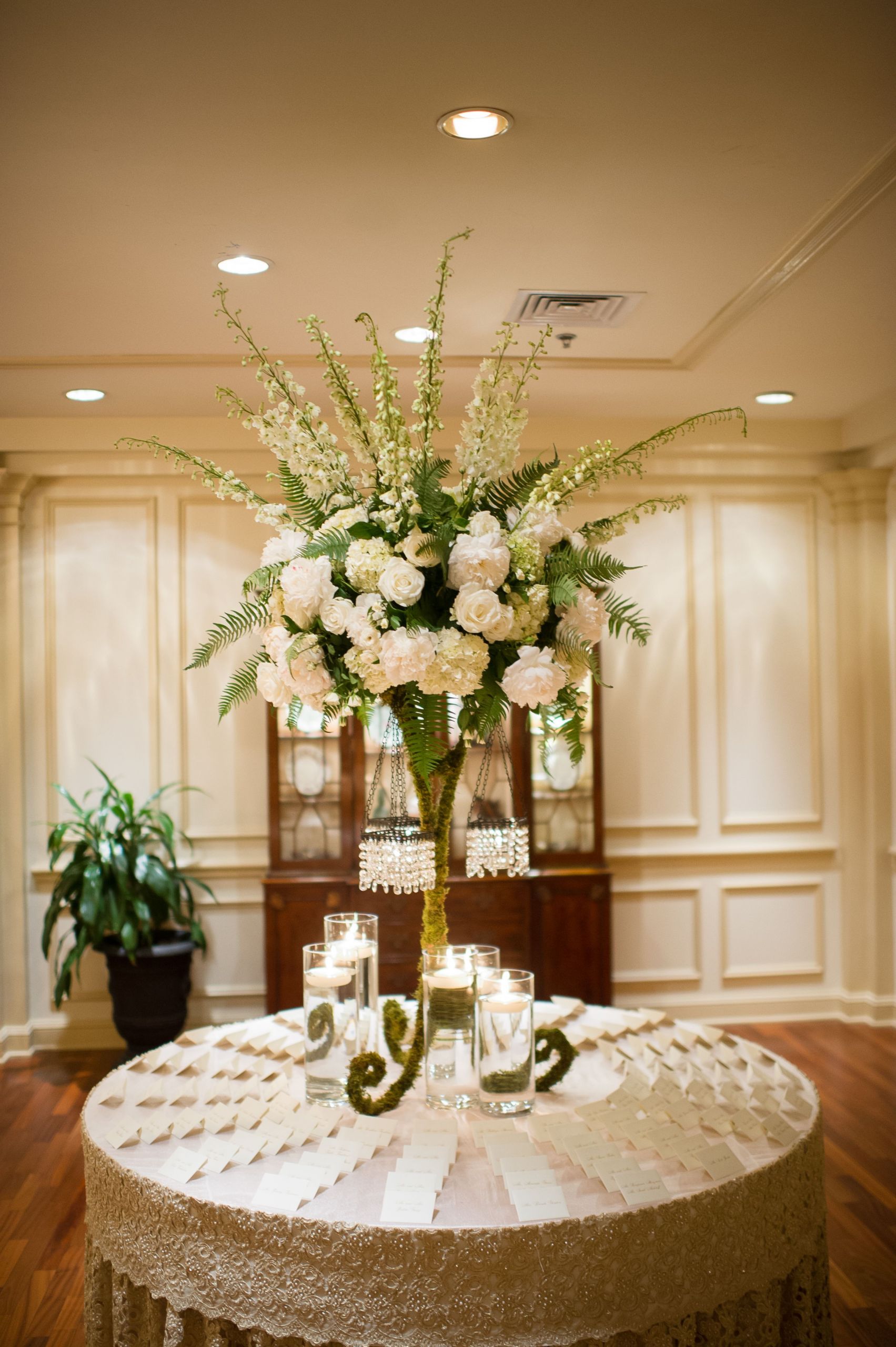 Wedding Reception Flowers
 Tall Flower Arrangement With Ivory Roses and Delphiniums