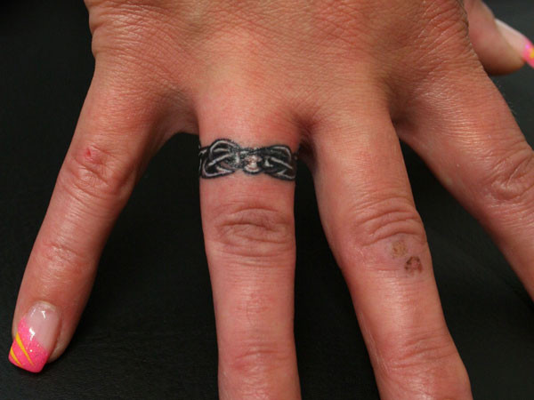 Wedding Ring Finger Tattoos
 25 Marvelous Ring Finger Tattoos SloDive
