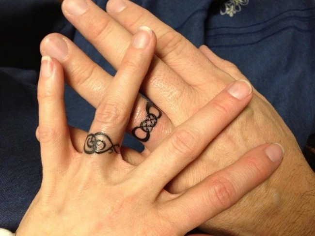 Wedding Ring Tattoo Designs
 50 Cool Wedding Ring Tattoos To Express Their Undying Love