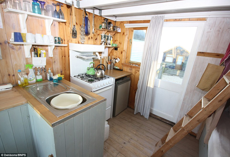 White Hut Kitchen
 Tiny beach huts without toilet or mains electricity on