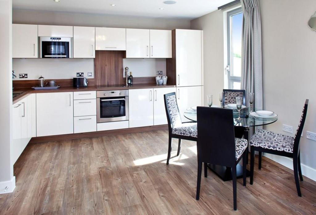 White Kitchen Wood Floors
 Kitchens with brown cupboards white kitchens with wood