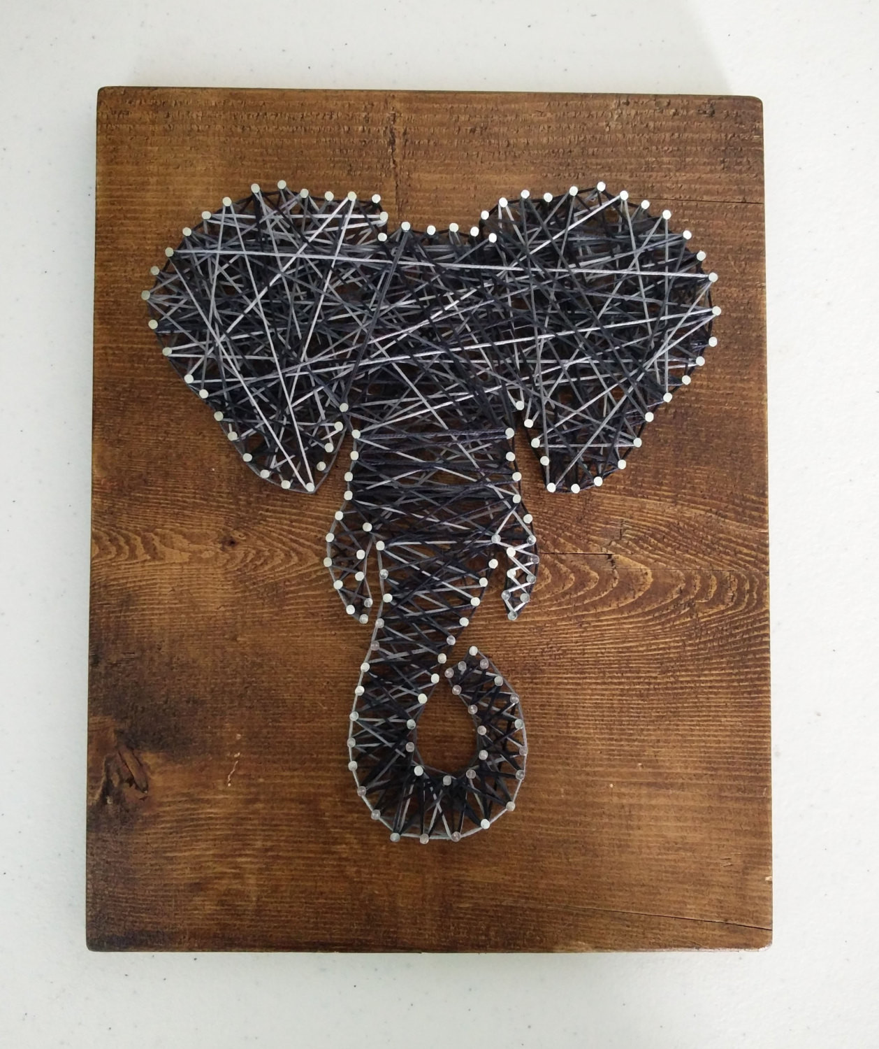 Wood And Nail Art
 Elephant String Nail Art on Stained Wood