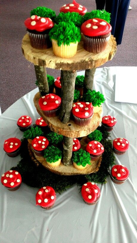 Woodland Themed Baby Shower Cupcakes
 Woodland moss & red mushroom cupcakes on a rustic wooden