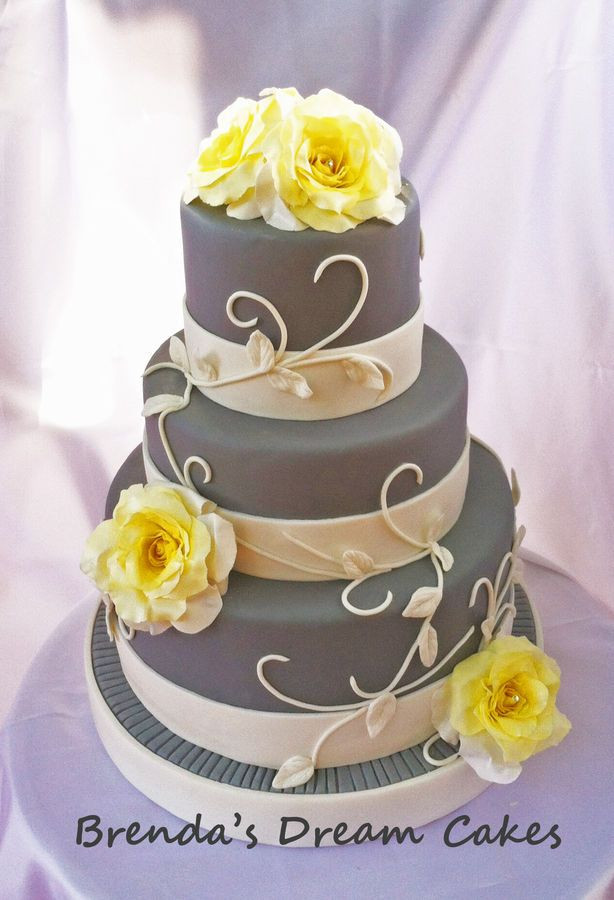 Yellow And Gray Wedding Cakes
 Elegant 3 tier Yellow Rose and Gray wedding cake all