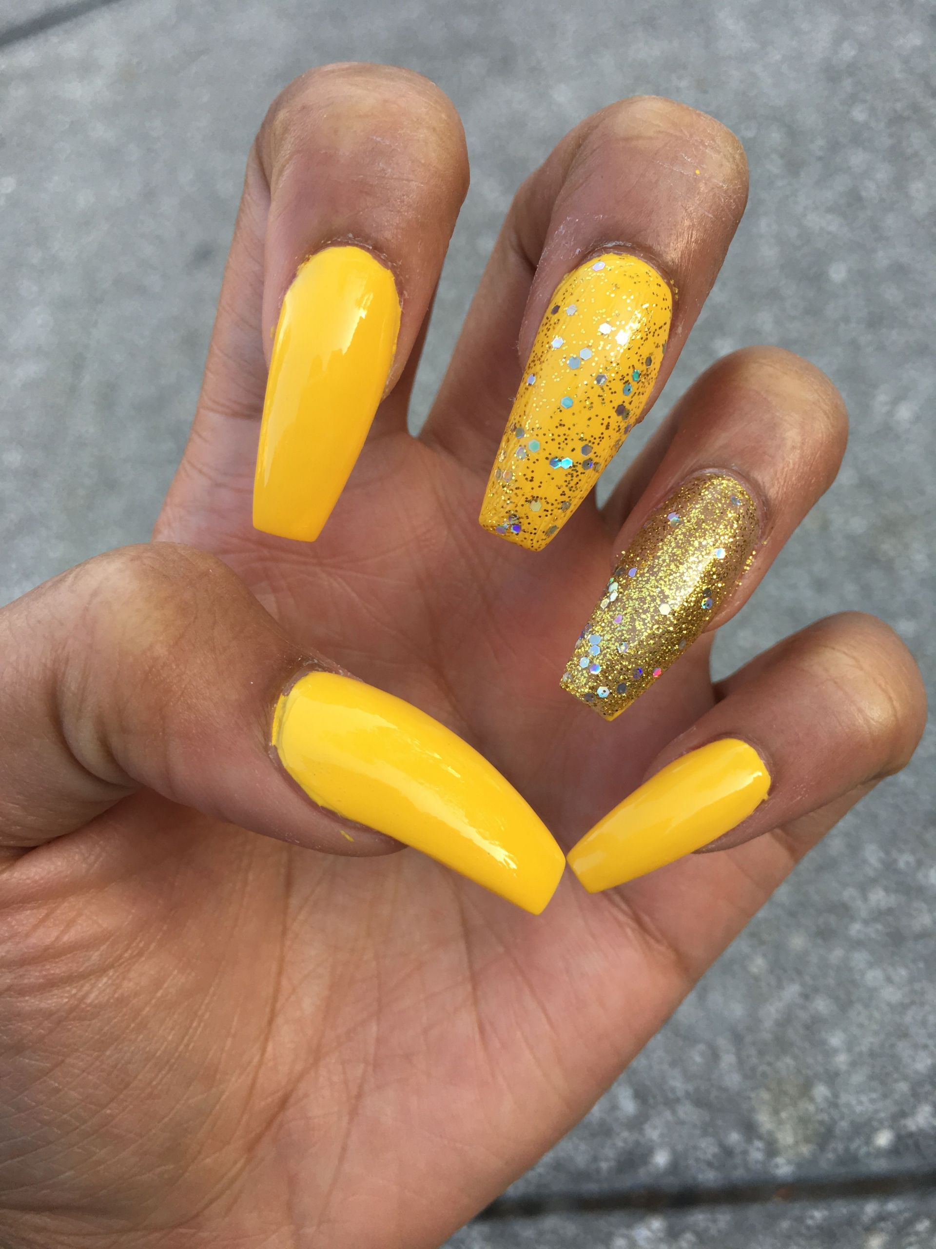 Yellow Glitter Nails
 yellow & gold coffin nails the yellow is to for