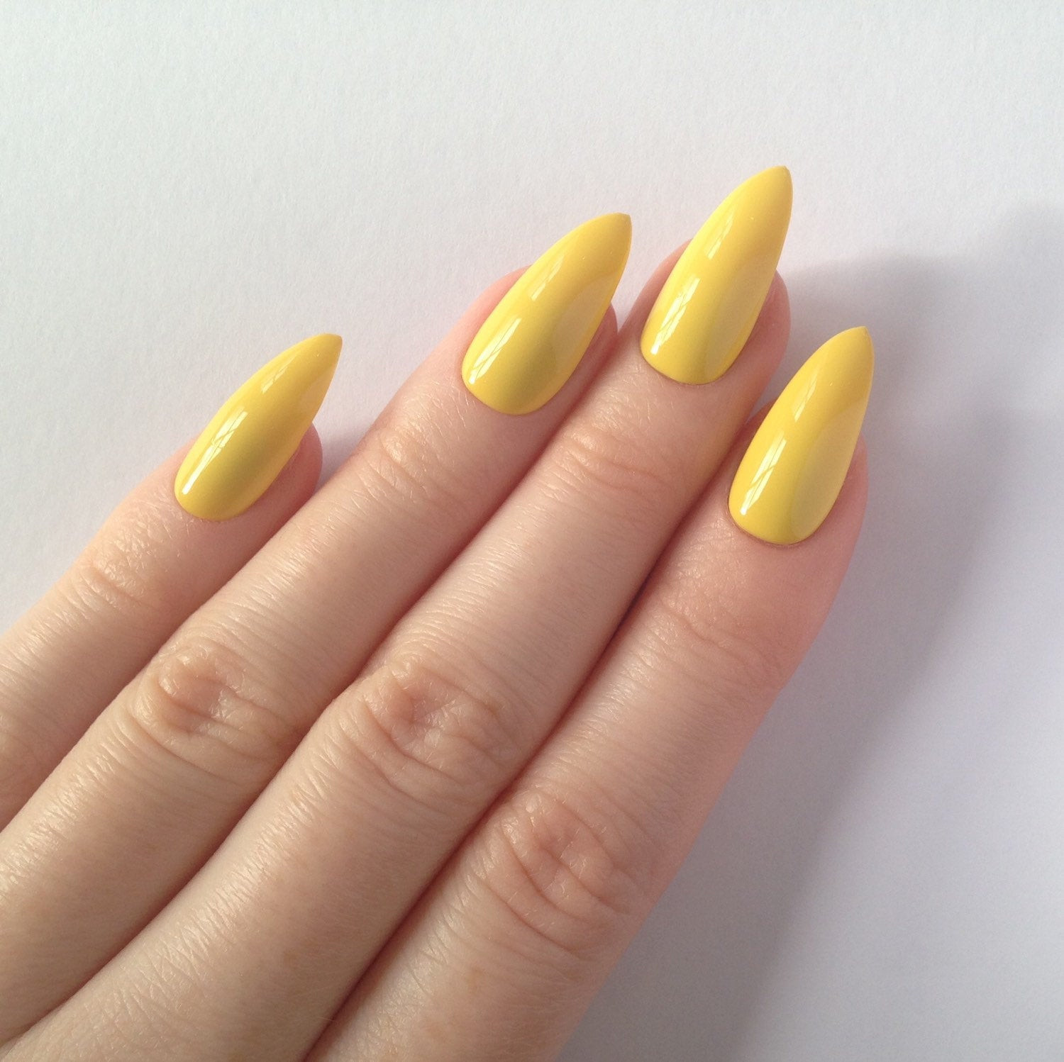 Yellow Nail Ideas
 Pastel yellow stiletto nails Nail designs by